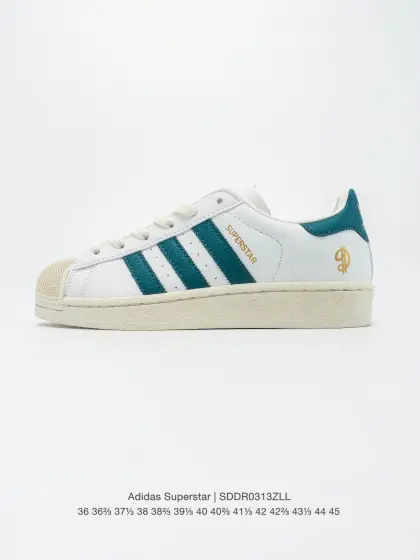 白绿金JQ6119 公司级🎈阿迪达斯 ADIDAS SUPERSTAR 三叶草☘️经典贝壳头系列 新款休闲板鞋潮流女士运动鞋.鞋面柔软皮革材质 标志性的贝壳鞋头,锯齿三条纹,简约的线条.就连版型和比例,都在向1982年的鞋款致敬.可谓“形神兼备”的复刻.无论在哪,无论去哪,你或许都需要这样一双既舒适又时尚的鞋.1970年问世于篮球场的adidas Superstar,集舒适与时尚于一身.这款经典鞋,缀低调图案,灵感源自公共交通地图.设计简约,旨在伴你出行.心动不如行动,系好鞋带,出发吧. 含半码 编码:SDDR0313ZLL